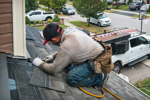 Professional Roofing technician working in Mont Belvieu, TX
